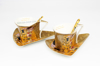 GUSTAV KLIMT - set trikotnih skodelic,krožnikov in žličk zlat