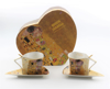 GUSTAV KLIMT - set trikotnih skodelic,krožnikov in žličk svetla